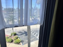 Privacy curtains on the front window were torn