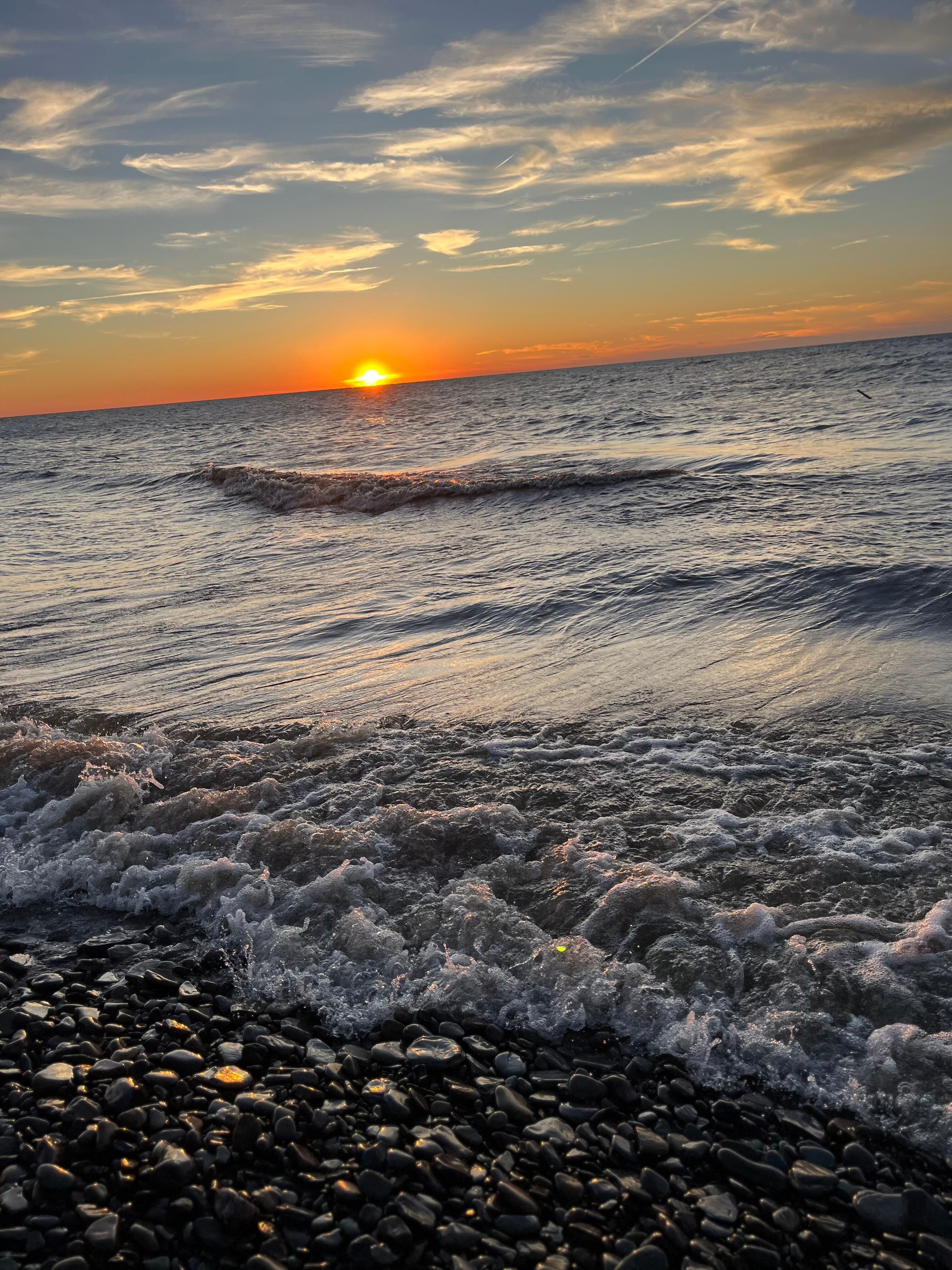 Freeport beach and it’s gorgeous sunsets / we spent most of our time here but there was a rip current advisory the second half of the trip - had fun going into Erie and mini golfing etc that day