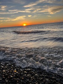 Freeport beach and it’s gorgeous sunsets / we spent most of our time here but there was a rip current advisory the second half of the trip - had fun going into Erie and mini golfing etc that day