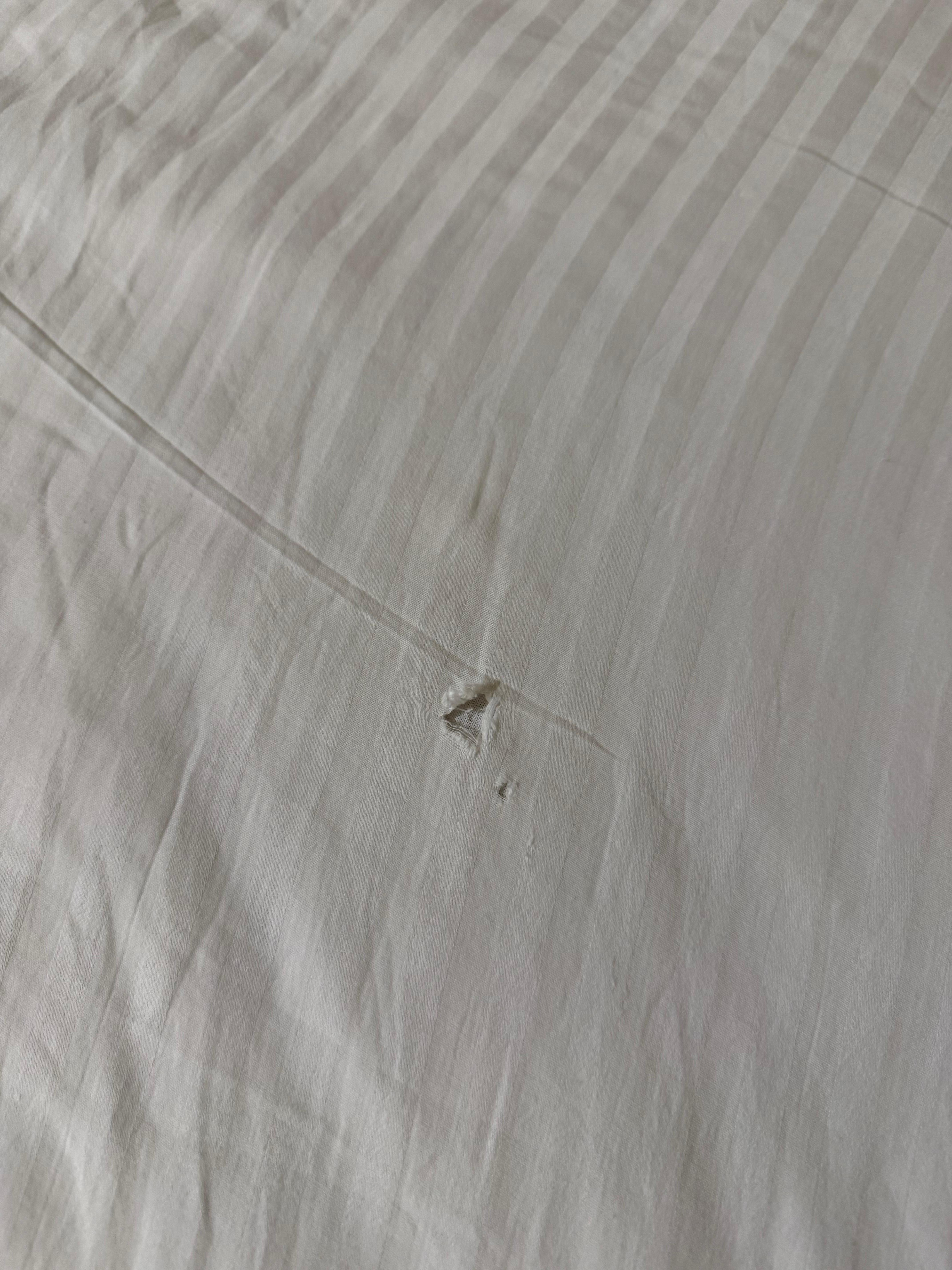 Torn bedsheet