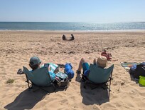The beach just over the dunes next to the house.