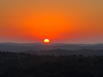 Recommend Enchanted Rock for sunrise or sunset when visiting