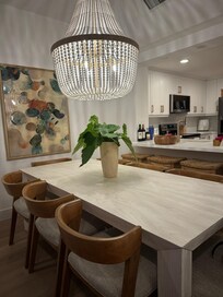 Fabulous Dining table that seats eight plus four counter stools.