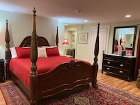 Beautiful spacious bedroom with king size bed.
