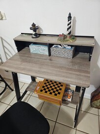 Desk with games under
