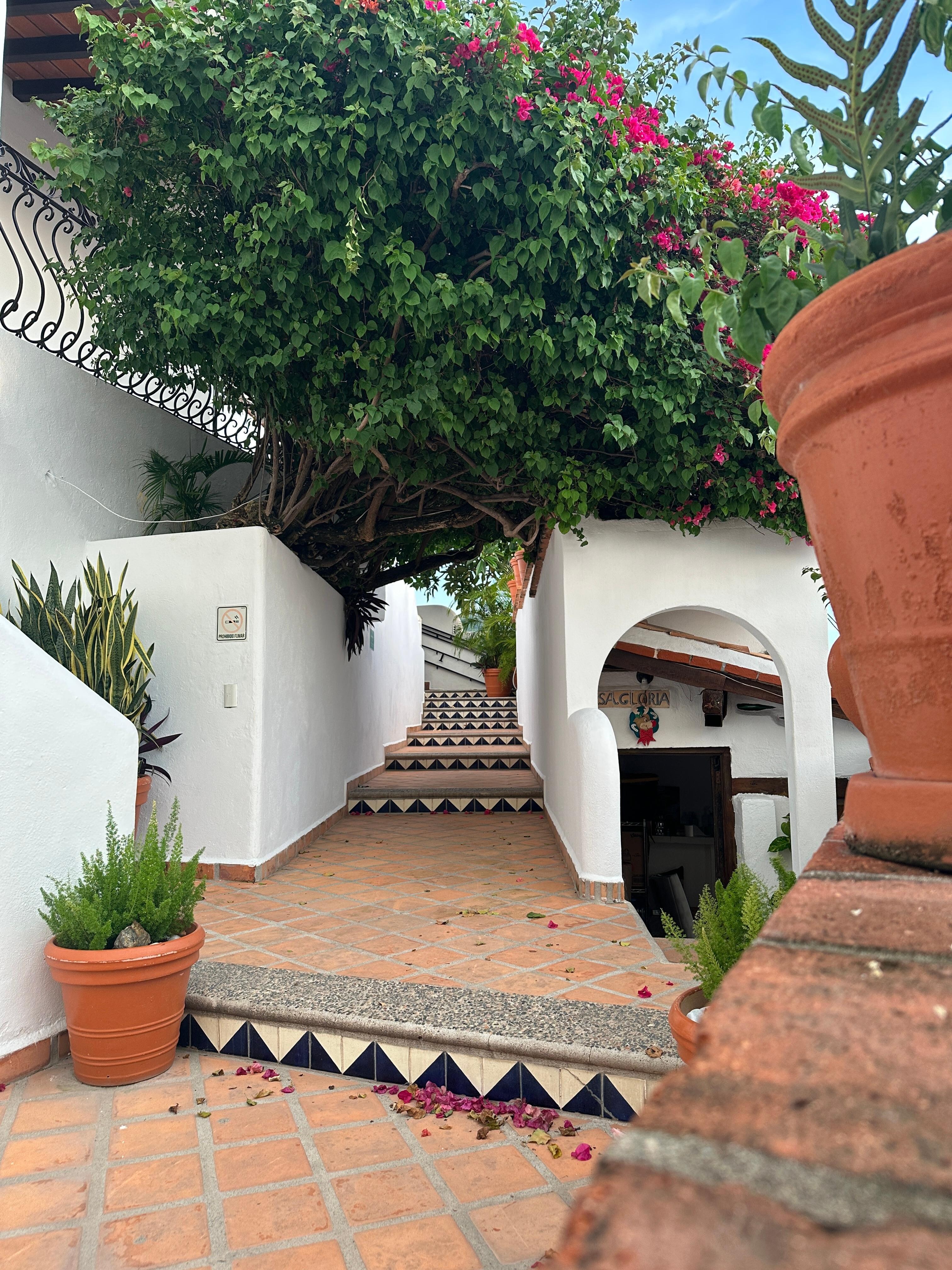 Stairs from the room to the main lobby and pool area.