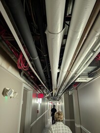 Hallway to the condo. No ceiling tiles