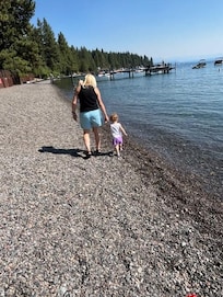 Nana and Ellen walking on the beach.