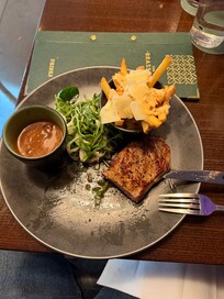 Strip steak with dirty fries dinner