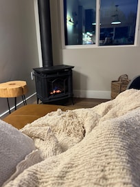 Couch was a comfortable place to relax and warm up by the fireplace after a long day of hiking!