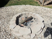 Early morning fire for those S'mores that we forgot to do the night before. Out of town guests need their treat for the road. Watch your step, the gravel is very sharp and the perimeter stones are very uneven
