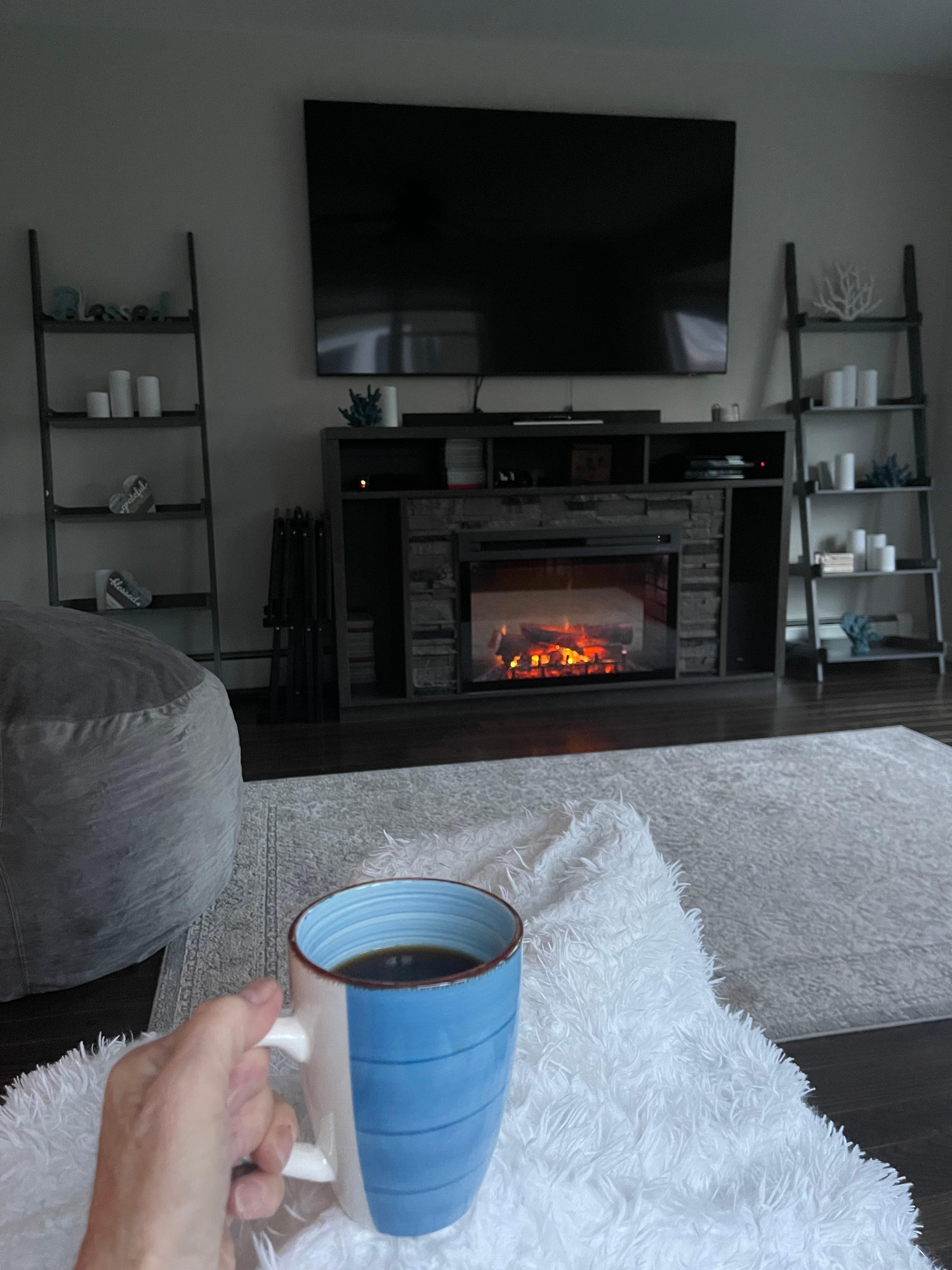 A cozy morning in December having coffee by the fire!