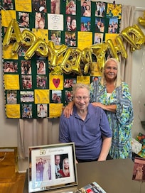 Our kids made us a beautiful patchwork quilt with all the pictures of all the memories of the kids. The grandkids are great grandkids of ourselves. It was just beautiful that they surprise us with at our anniversary party.