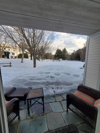 View from Living room toward pool, ski over to lift
