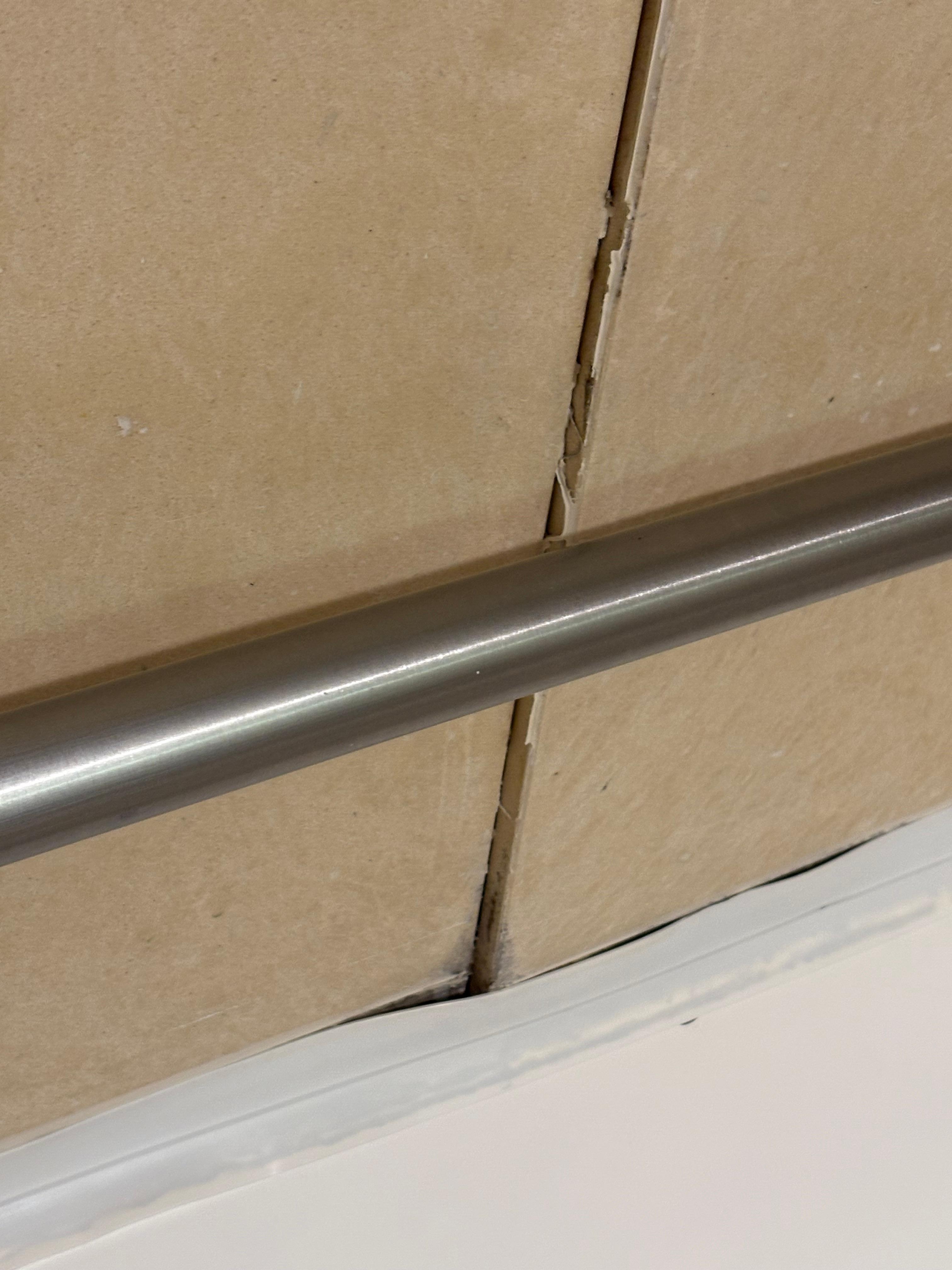 Wall of the shower was coming apart and was dirty/ moldy