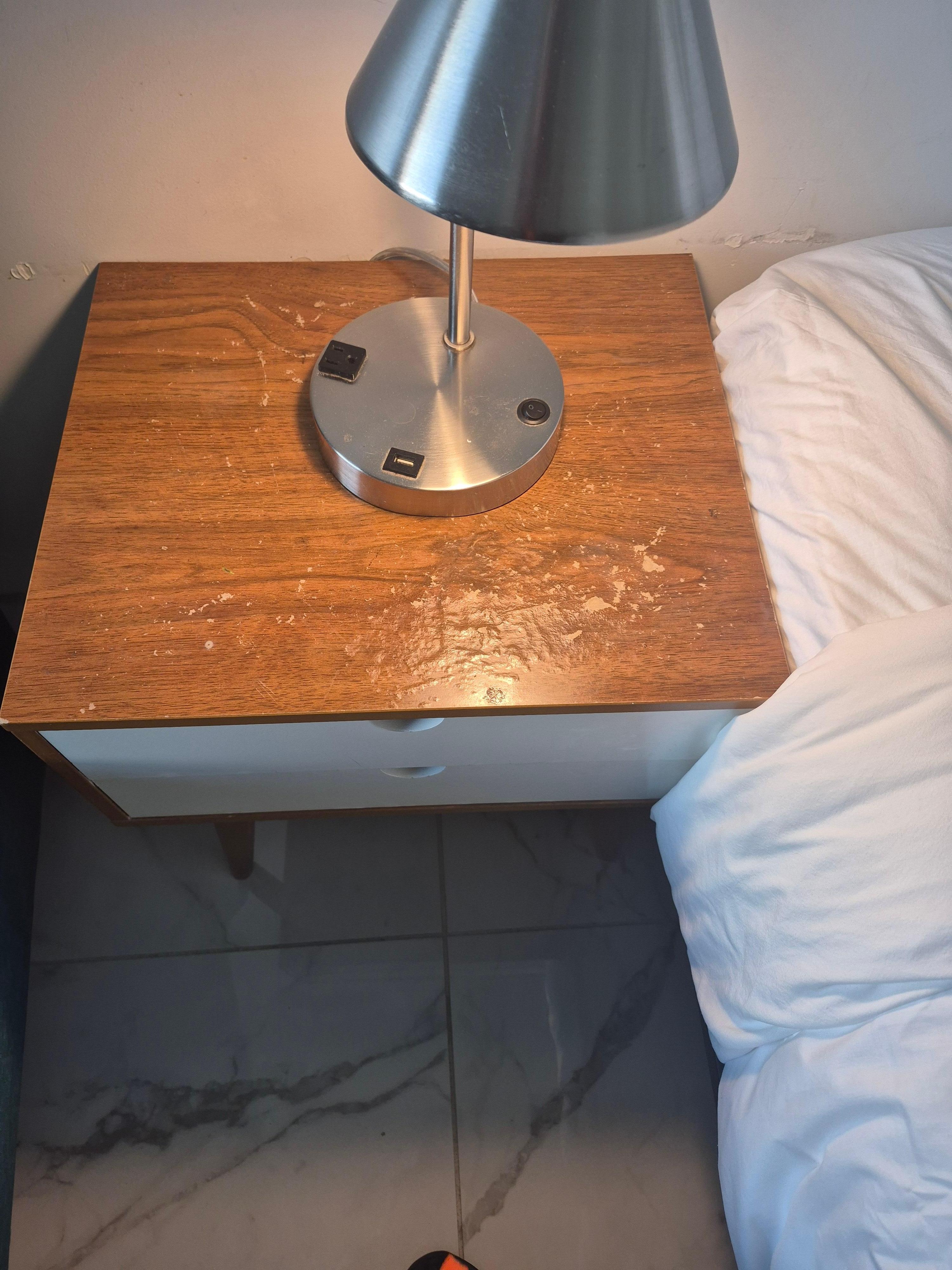 Or room was very much in need of a refresh, mini makeover. Obvious water damage on both might stands with a prominent odor of mildew.