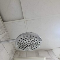 Pomme de douche dans un état incroyable