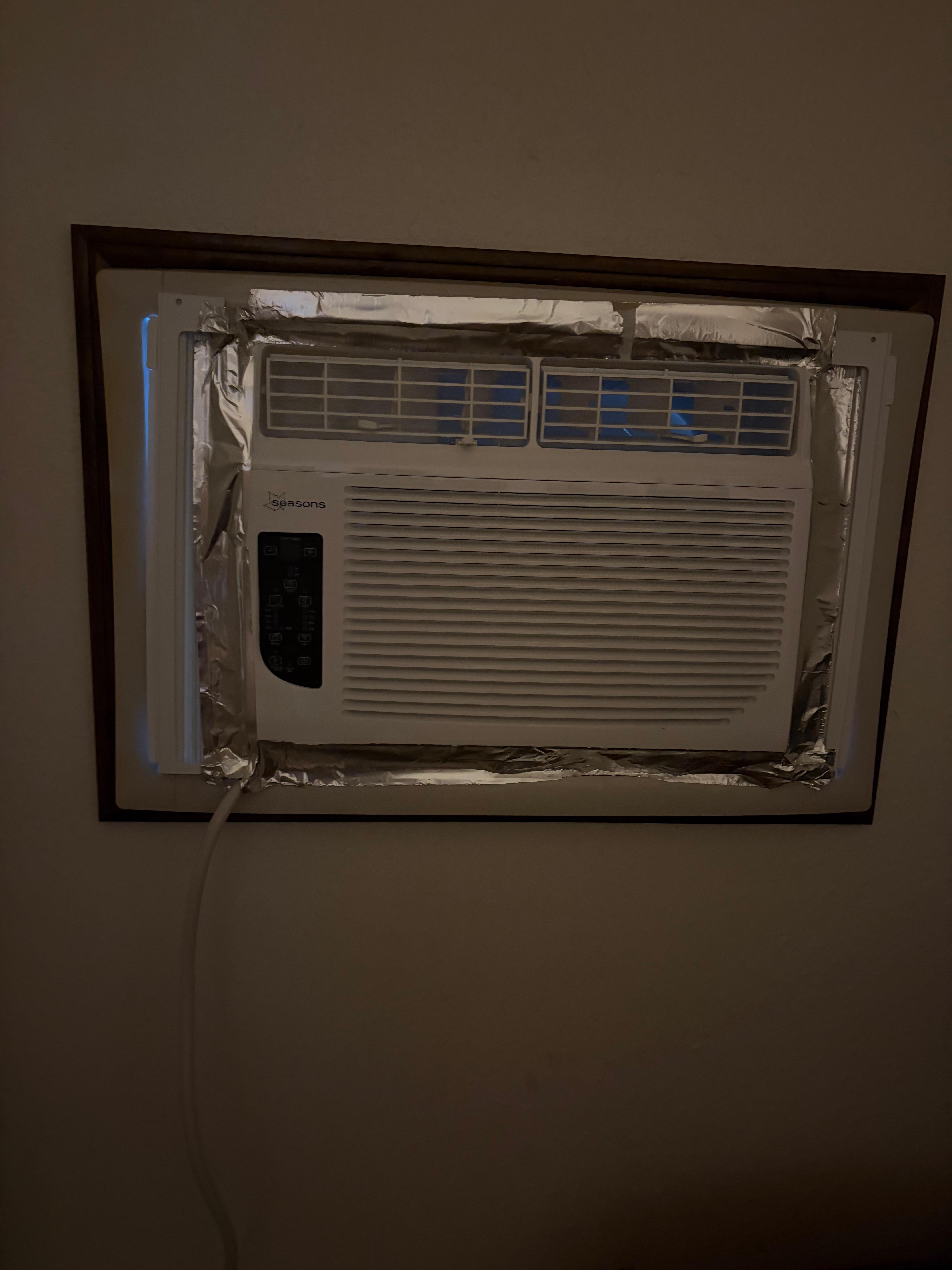 Air conditioner, installed with duct tape