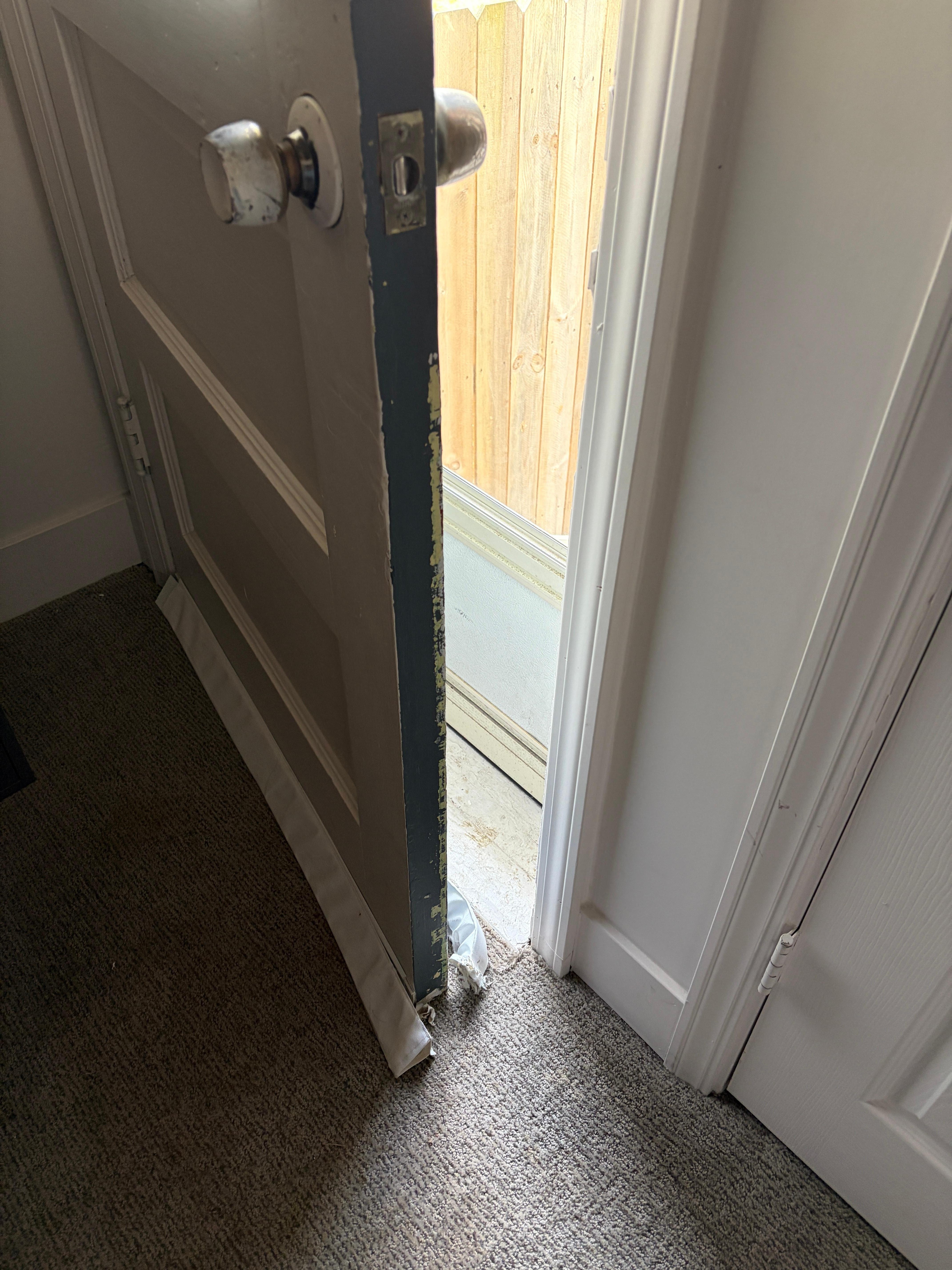 Backdoor won't open with weatherstripping