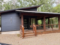 Front of cabin. Plenty of space for two and also cozy! Plenty of deer roaming around. Fun watching deer while having coffee on deck.