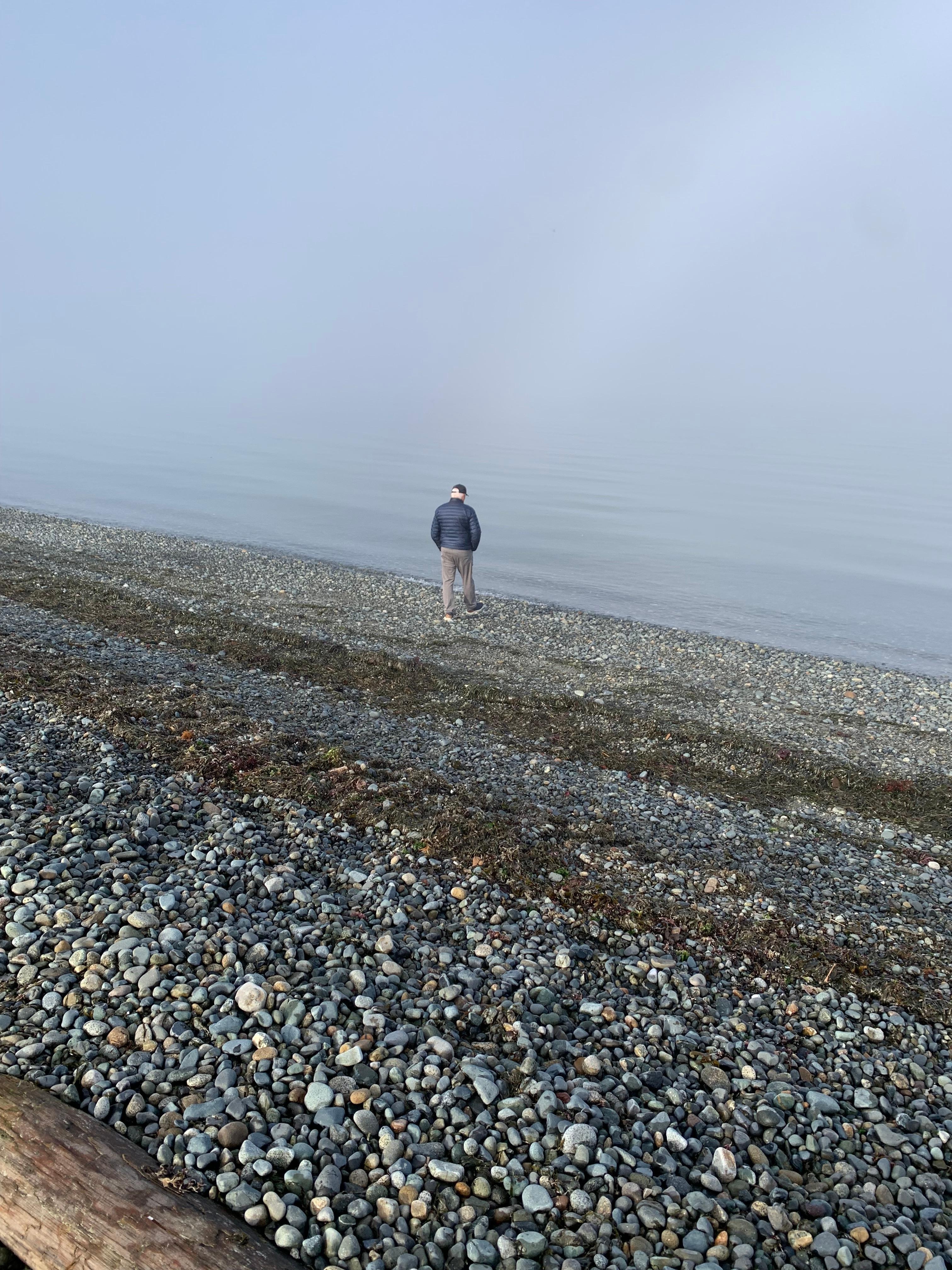 A foggy seaside stroll. 