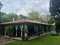 Large lovely patios on two sides of the house