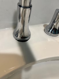 Gap in base of faucet