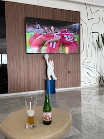 big screen tv in lounge with Liverpool fc live