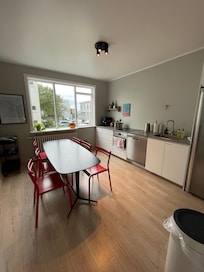 Kitchen. Each room gets a basket labeled in the fridge