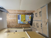 One elevator working, sign disclosing about the dust and lobby walkway closed. Had to walk through this area to access the elevator.