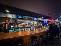 100 steps away. Hooks Bar.