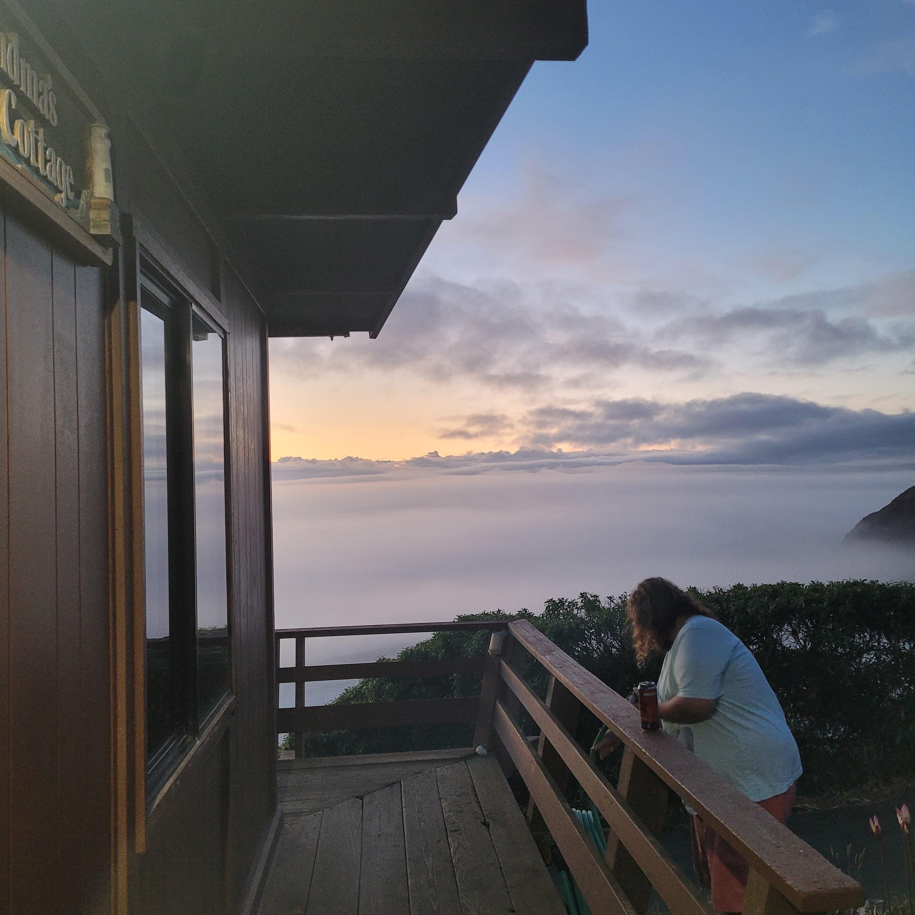 Front door view on a foggy in September sunset day.