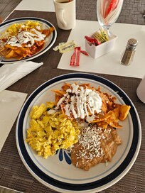 Chilaquiles were super hard and the beans tasted bad. It looked good tho.