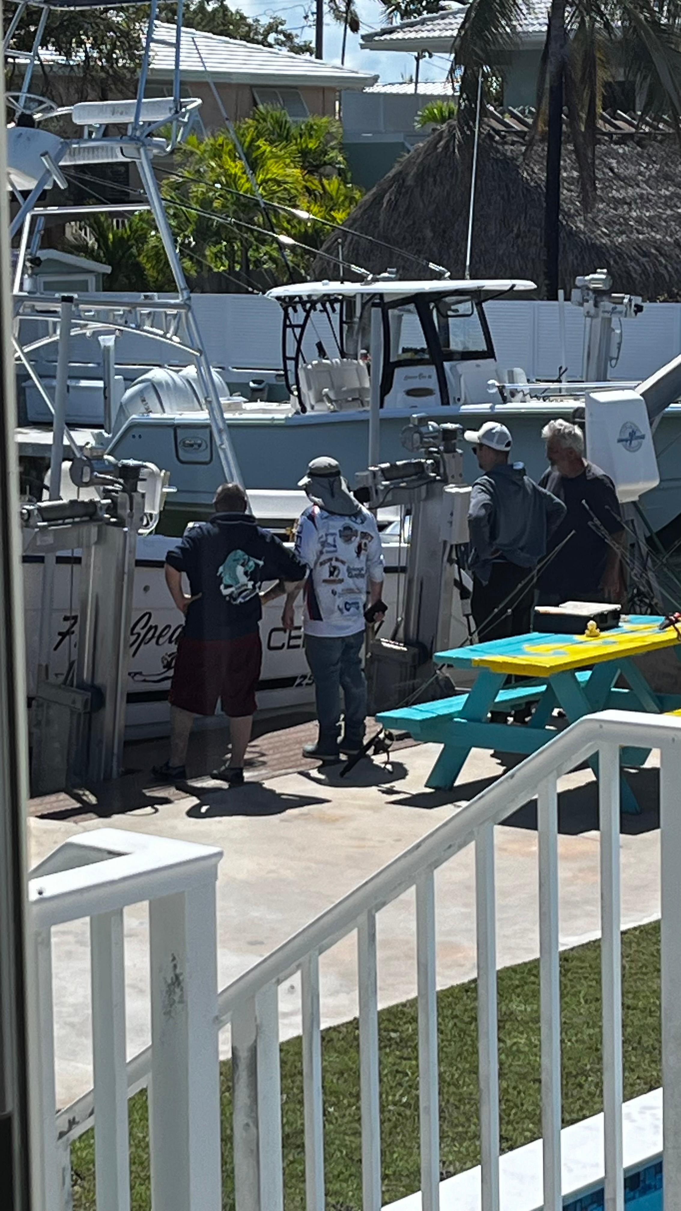 Awaiting fishing trip with owner (charter or friend...from the observed dynamic it appeared to be a charter) 