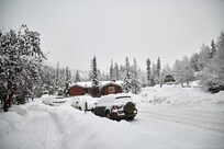 In front of the unit, with the reception desk in the background.