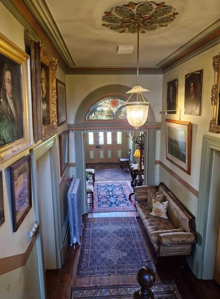 View of hallway at the top of the stairs