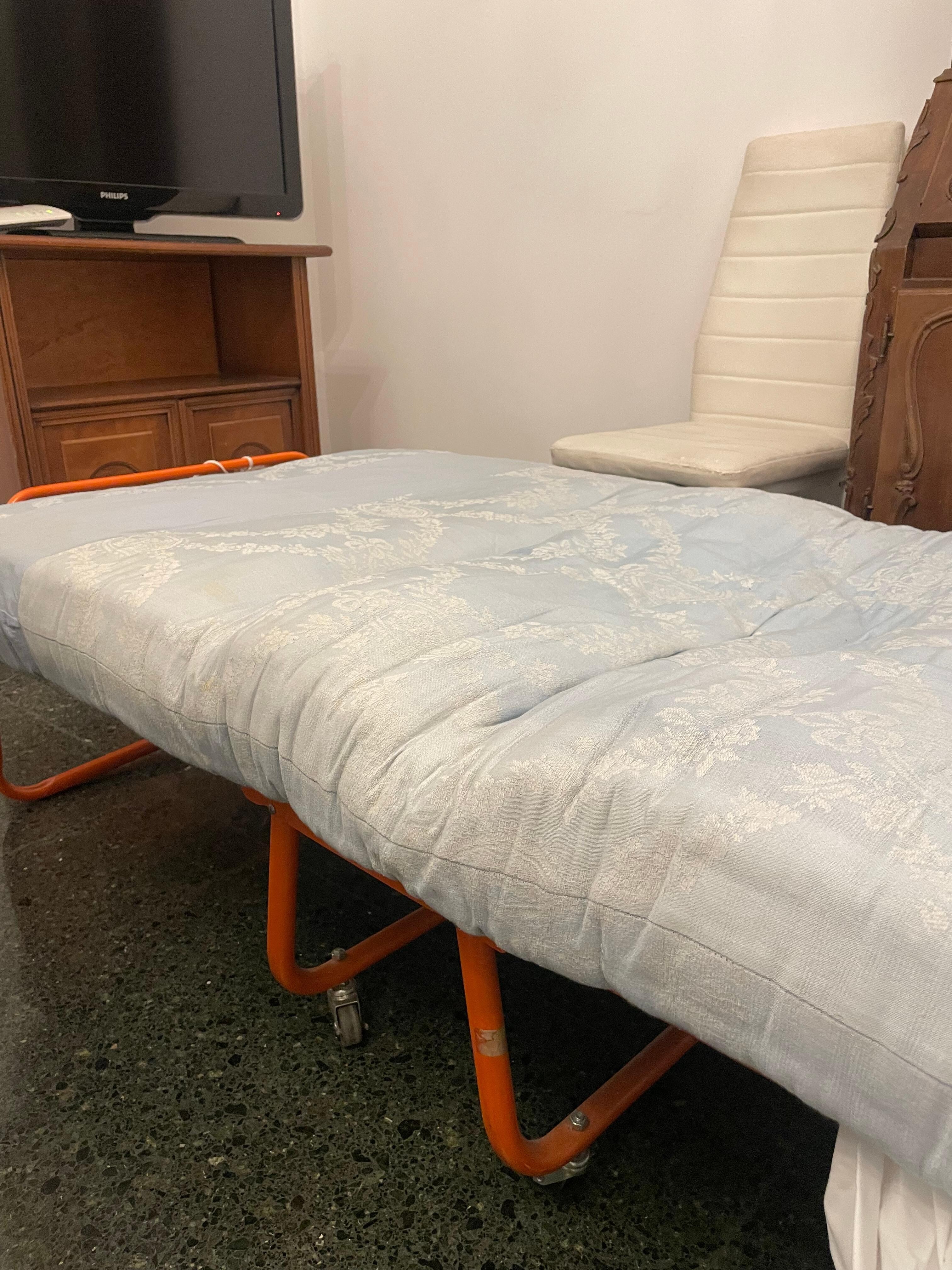 A worn out mattress with no linen and perfect to get back injury
