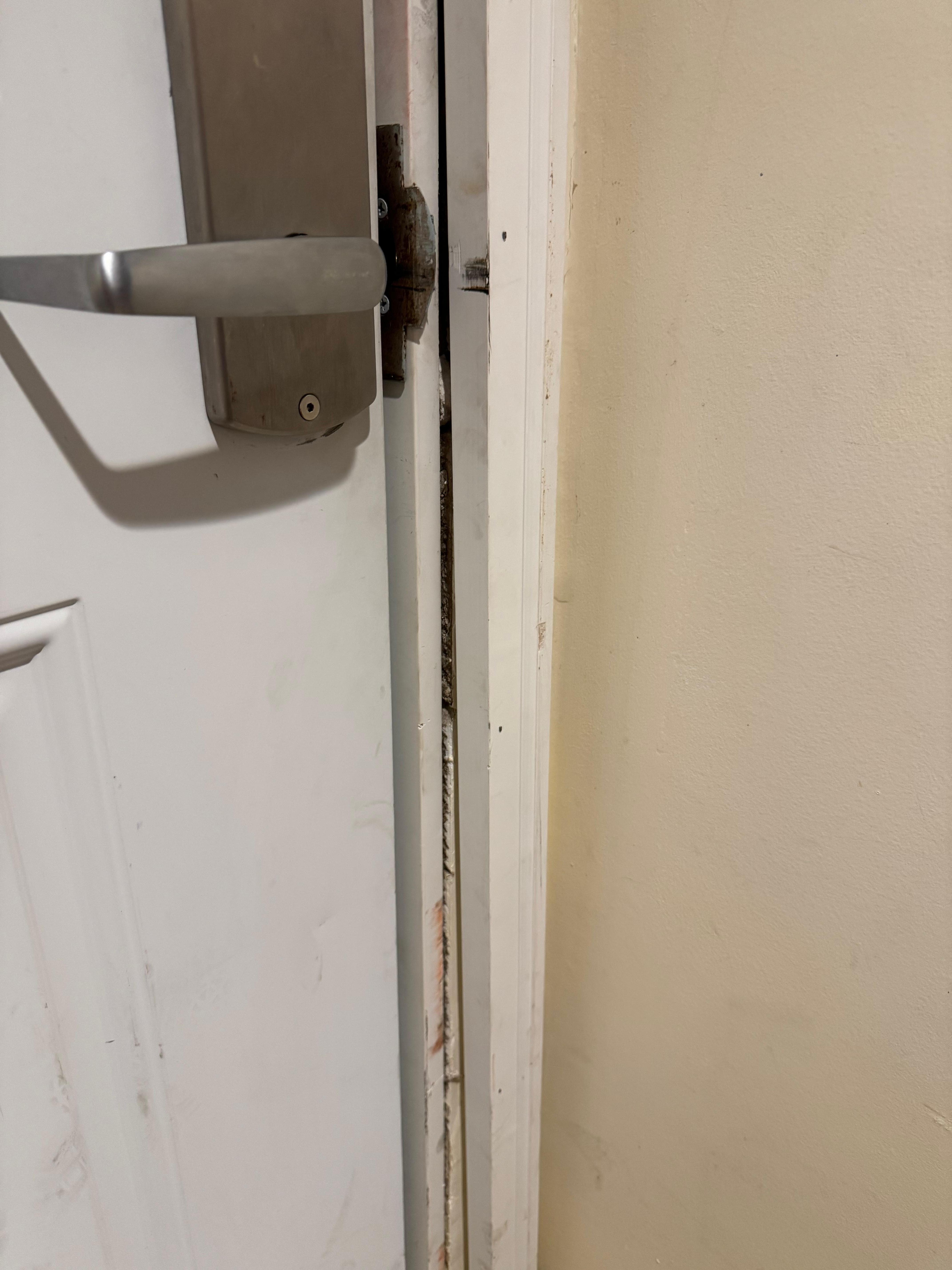 Front door was unsafe and did not close properly.