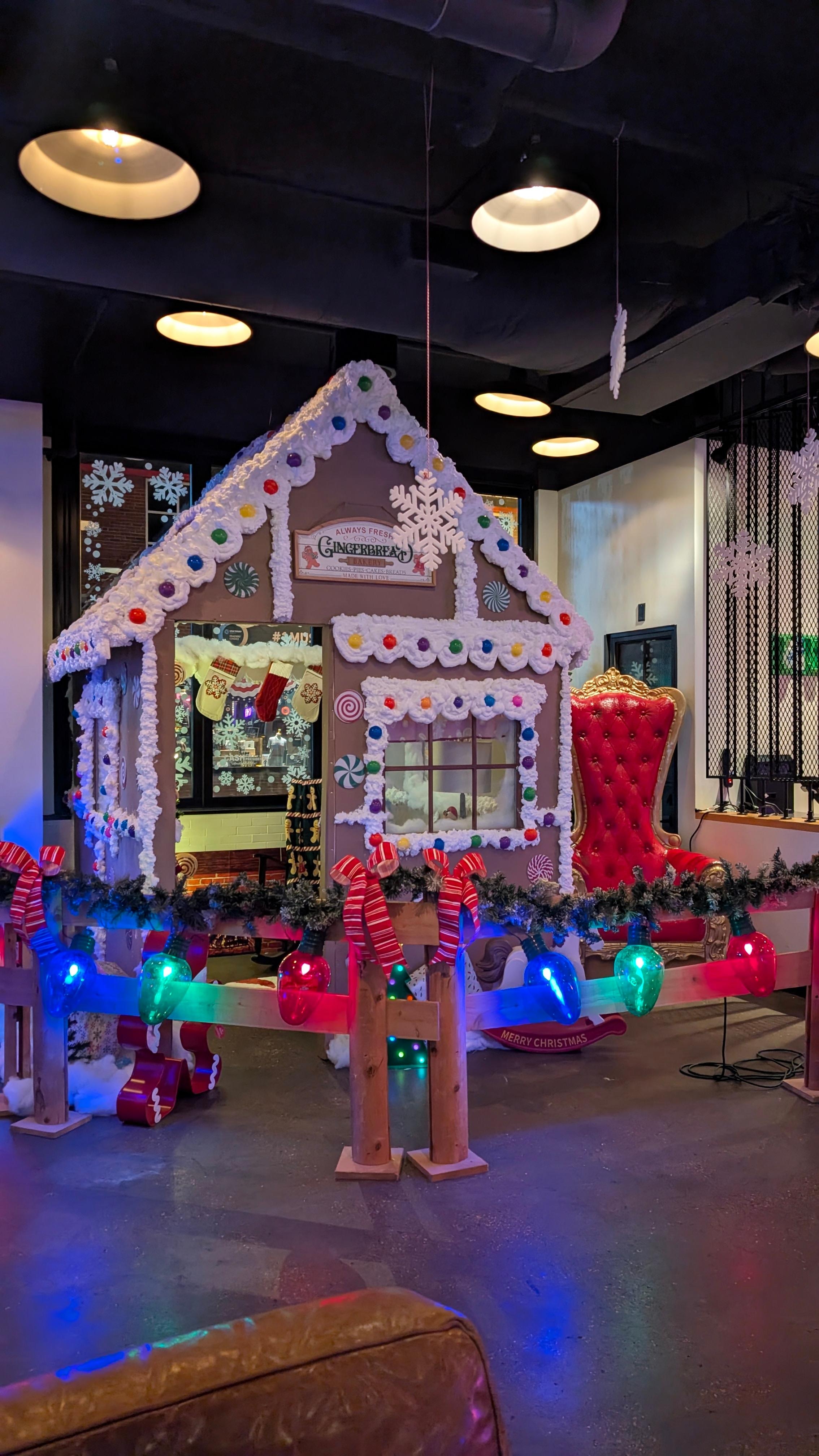 cool gingerbread house in the entry