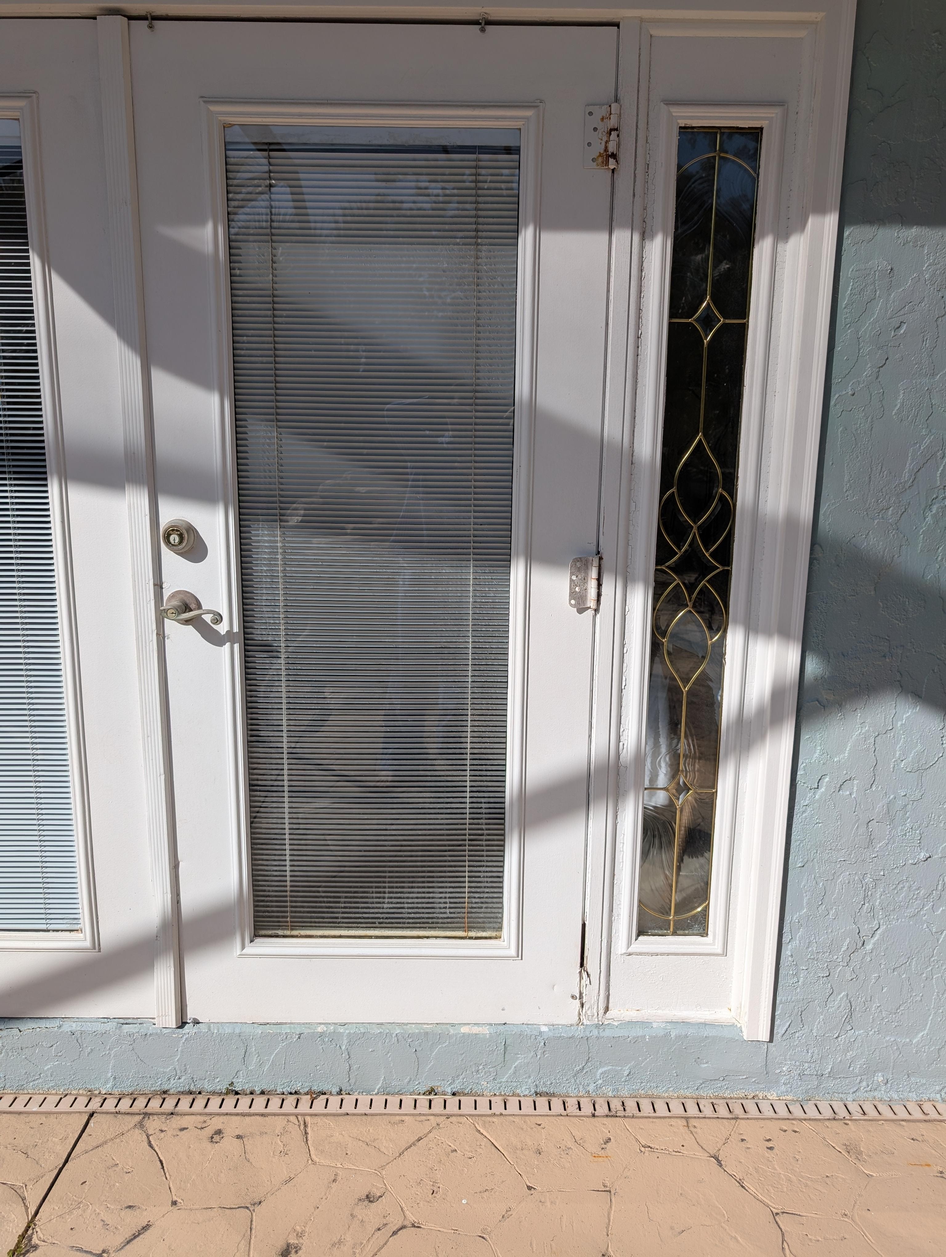 Outside of French doors, bolted shut and moldy 
