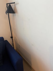 Dirty worn walls everywhere - cheap unplugged lamp