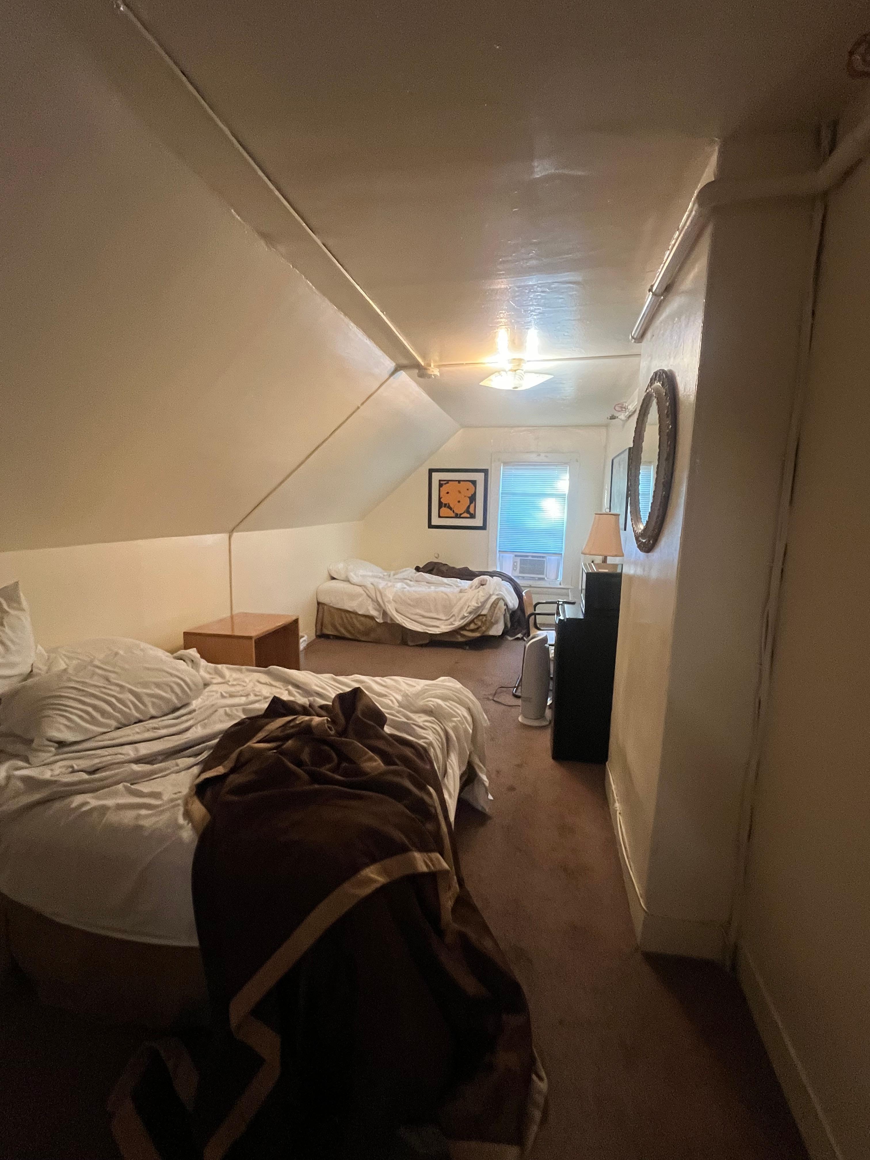 (The beds were made when we arrived.) The carpet was pretty gross. Grafitu on the wall art. Other than these things, the room was safe, comfortable, and quiet.