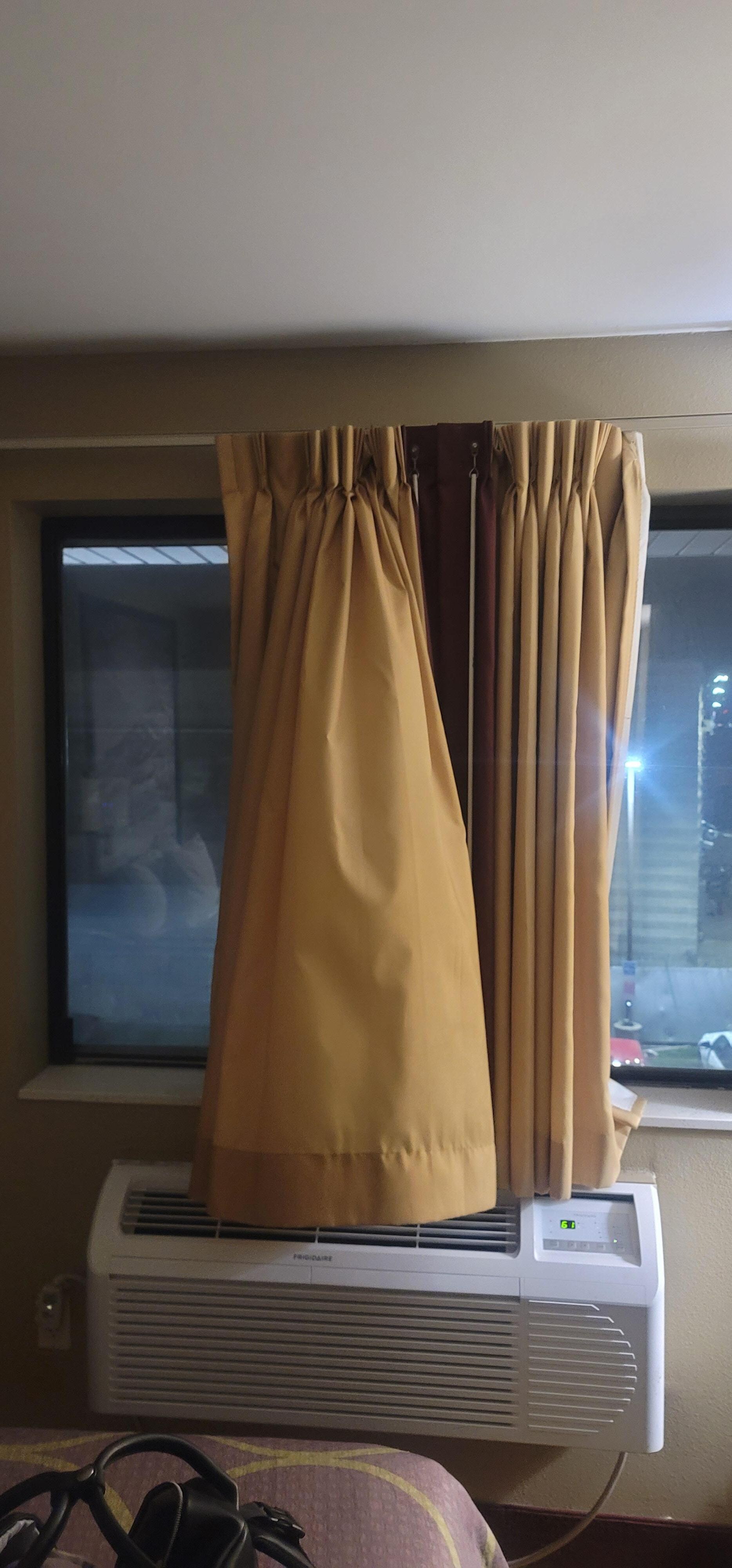 These curtains are not supposed to work like this. 