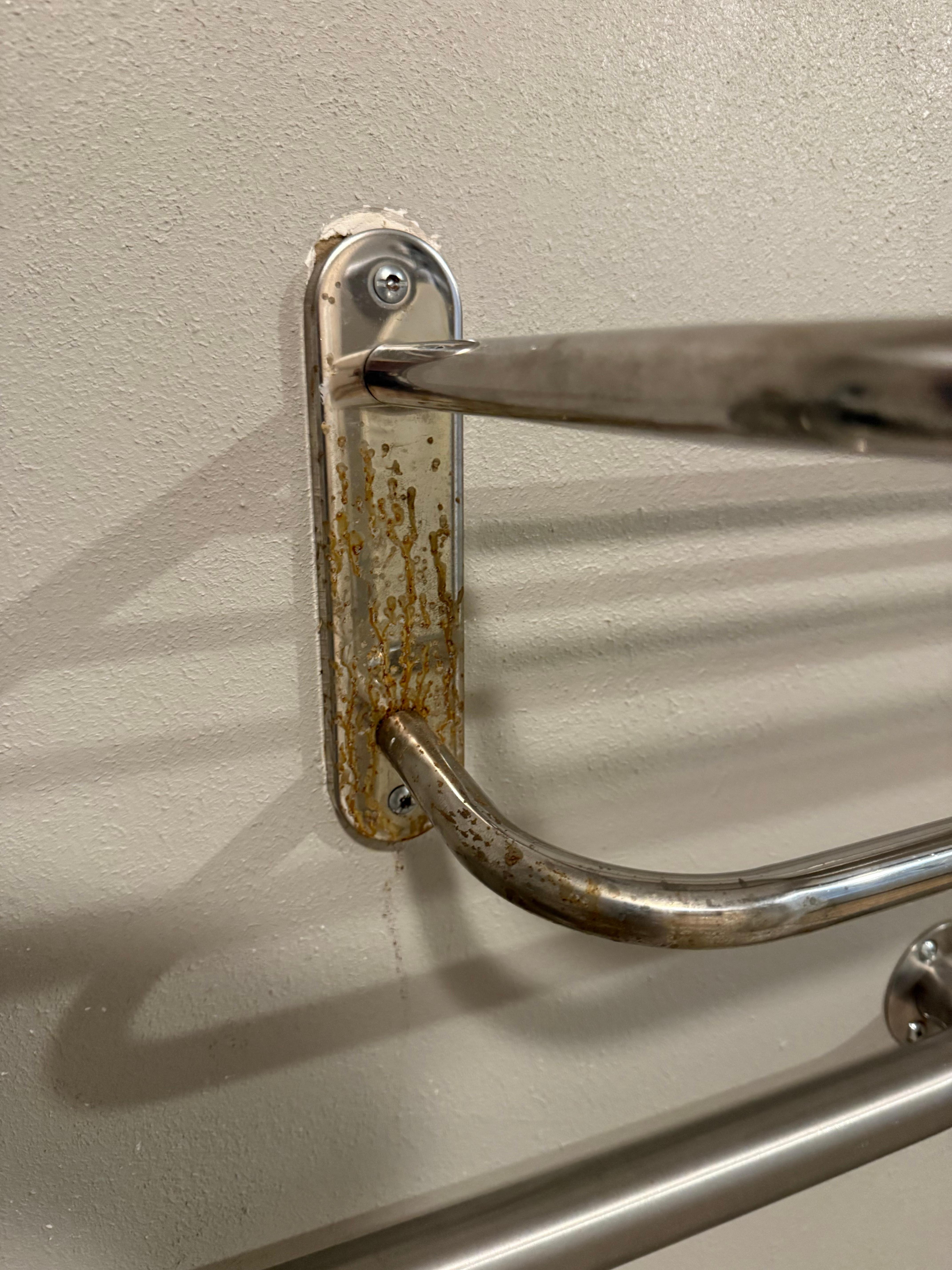 Dirty rusty towel rods