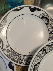 Dirty dishes in the cupboards.