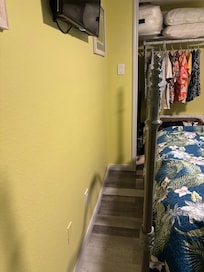 Not much space to walk around end of bed.