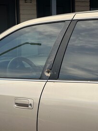 Car parked next to me had a bullet hole.