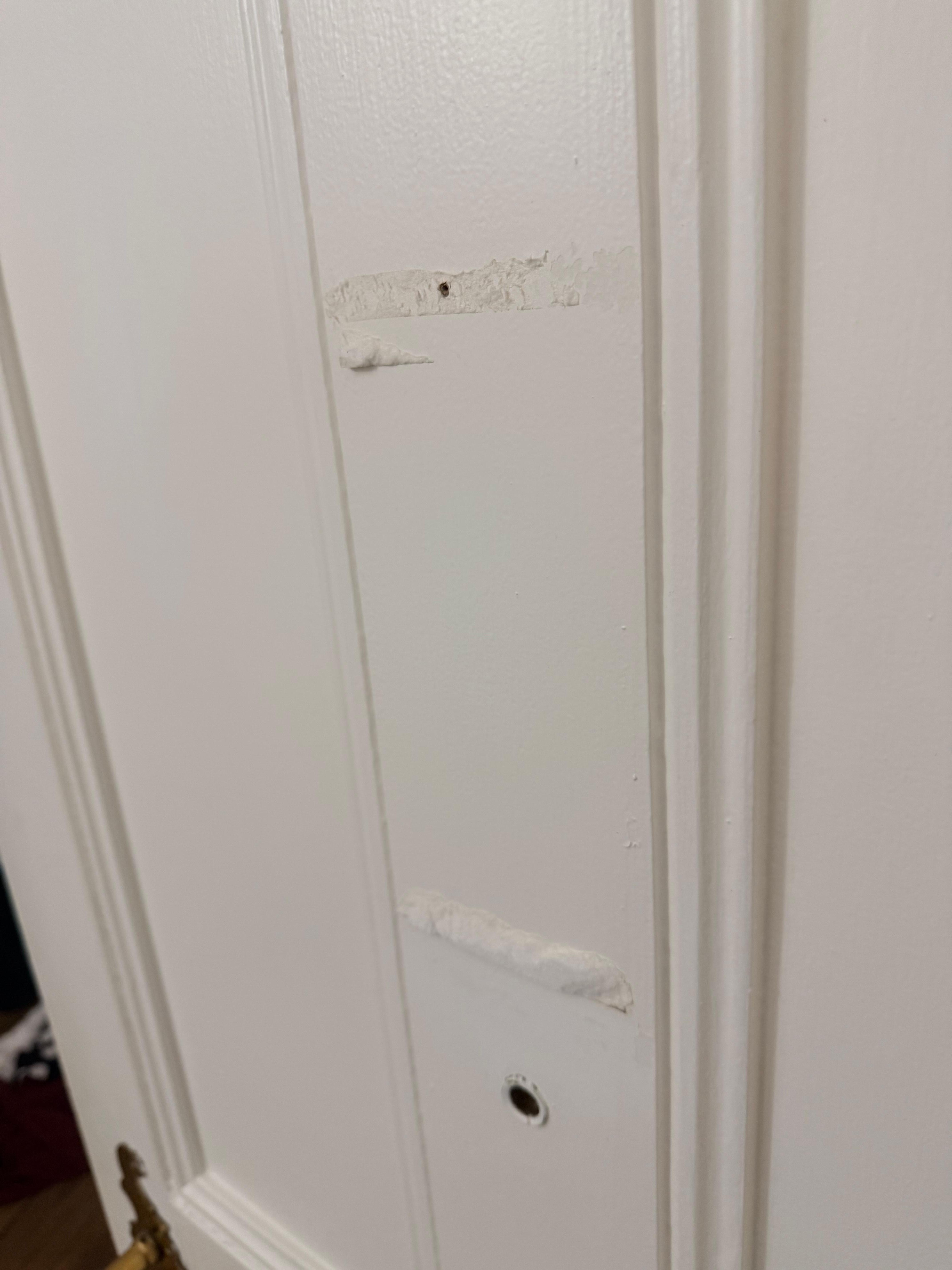 Double sided tape stuck to the door