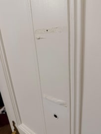 Double sided tape stuck to the door