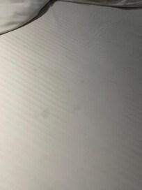 Spots all over the Sheets. Shests were overused until they became yellow.